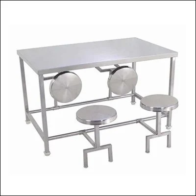 Stainless steel dining table with four attached fold-out stools on a tubular frame - commercial canteen and cafeteria seating