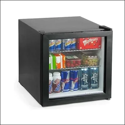 Compact countertop glass door mini display cooler stocked with cans and snacks - commercial beverage merchandiser