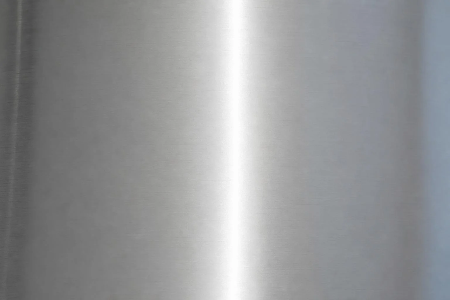 Smooth hygienic brushed stainless steel finish on a commercial kitchen surface